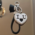 Нежно сърце 6 на 4 см с хамелеон кристали и надпис I LOVE YOU   с черна каишка на ключодържател 14 см S-KL1071